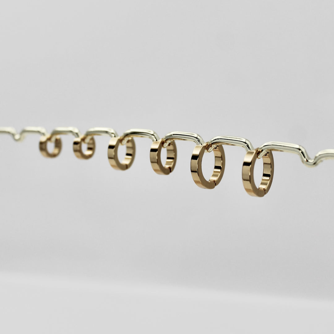 TRIPLE RINGS OORBELLEN