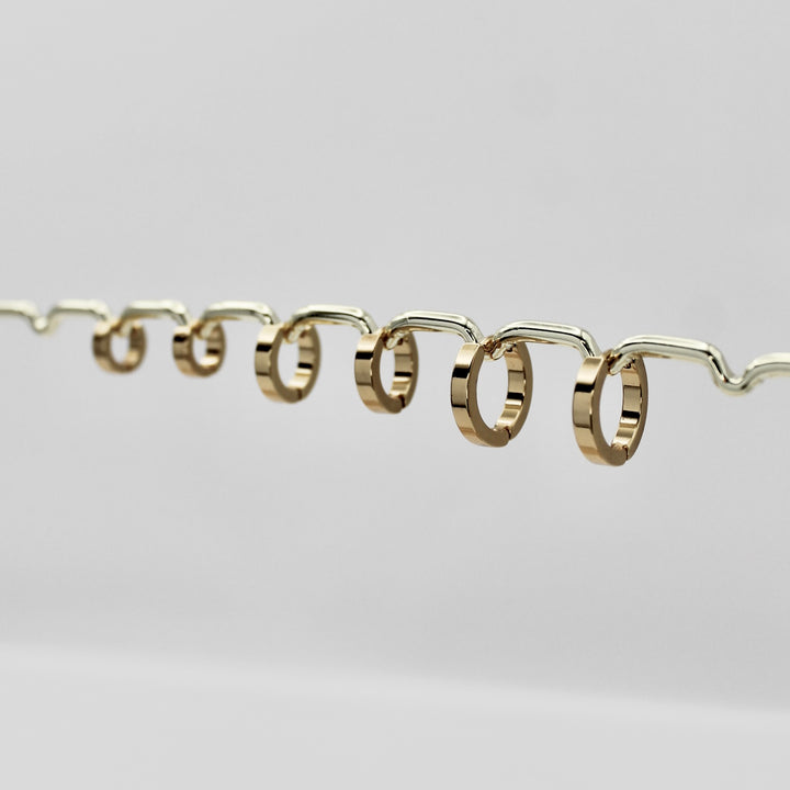 TRIPLE RINGS OORBELLEN