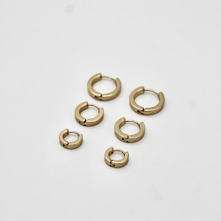 TRIPLE RINGS OORBELLEN
